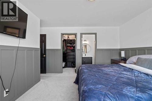 21 Wilson Road Ne, Langdon, AB - Indoor Photo Showing Bedroom