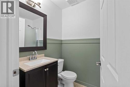 21 Wilson Road Ne, Langdon, AB - Indoor Photo Showing Bathroom