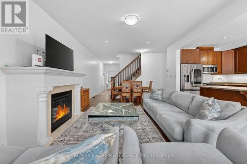 63 Chamomile Drive, Hamilton, ON - Indoor Photo Showing Living Room With Fireplace