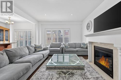 63 Chamomile Drive, Hamilton, ON - Indoor Photo Showing Living Room With Fireplace