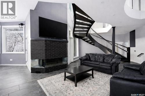3601 Grassick Avenue, Regina, SK - Indoor Photo Showing Living Room With Fireplace