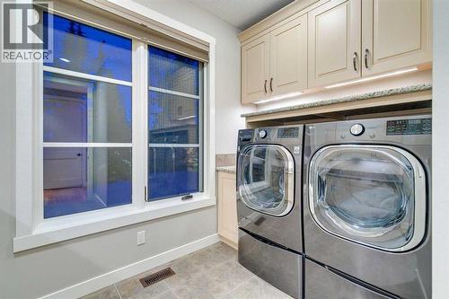 215 Patton Court Sw, Calgary, AB - Indoor Photo Showing Laundry Room
