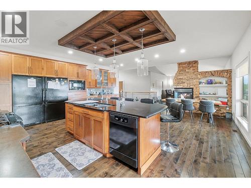 1720 Morrison Road, Kelowna, BC - Indoor Photo Showing Kitchen With Fireplace