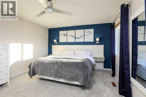 711 Moonlight Crescent W, Lethbridge, AB - Indoor Photo Showing Bedroom
