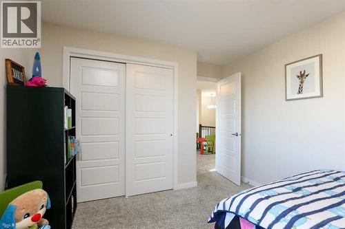 711 Moonlight Crescent W, Lethbridge, AB - Indoor Photo Showing Bedroom