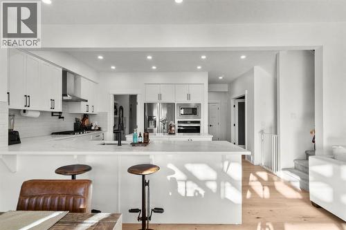 116 Ranchers View, Okotoks, AB - Indoor Photo Showing Kitchen With Upgraded Kitchen