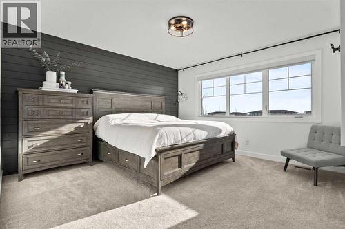 116 Ranchers View, Okotoks, AB - Indoor Photo Showing Bedroom
