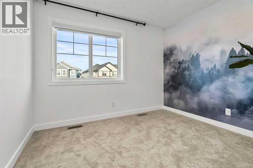 116 Ranchers View, Okotoks, AB - Indoor Photo Showing Other Room