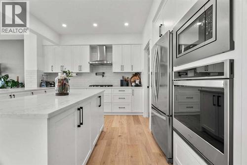 116 Ranchers View, Okotoks, AB - Indoor Photo Showing Kitchen With Upgraded Kitchen