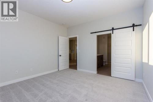 Photos and renderings are examples from a similar home built previously and do not necessarily reflect finished and colours used in this home - 41 Terra Close, Red Deer, AB - Indoor Photo Showing Other Room