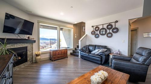 4134 Camelback Way, Vernon, BC - Indoor Photo Showing Living Room With Fireplace