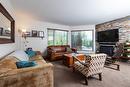 121-4559 Timberline Crescent, Fernie, BC  - Indoor Photo Showing Living Room With Fireplace 