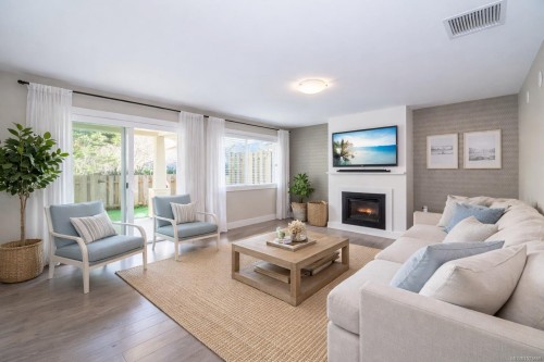 2121 Charters Rd, Sooke, BC - Indoor Photo Showing Living Room With Fireplace