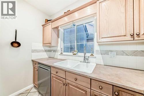 Kitchen - 1906 Patterson View Sw, Calgary, AB - Indoor Photo Showing Kitchen With Double Sink