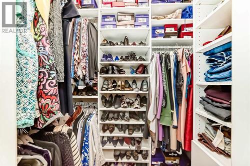 Walk-in closet - 1906 Patterson View Sw, Calgary, AB - Indoor With Storage