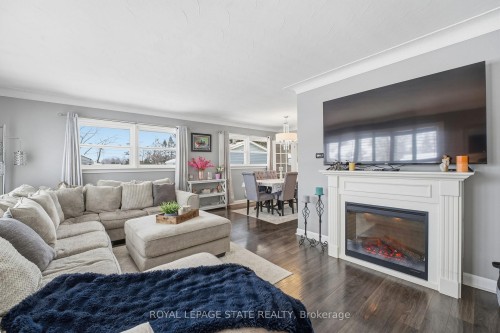 473 Mohawk Road W, Hamilton, ON - Indoor Photo Showing Living Room With Fireplace