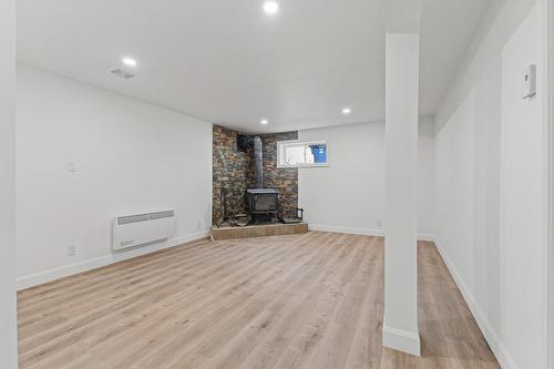 Salle familiale - 149 Rue Bernard, Saint-Constant, QC - Indoor With Fireplace