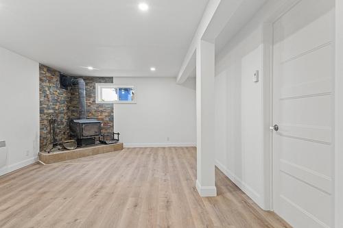 Salle familiale - 149 Rue Bernard, Saint-Constant, QC - Indoor With Fireplace