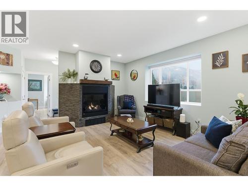 402 11 Avenue, Keremeos, BC - Indoor Photo Showing Living Room With Fireplace
