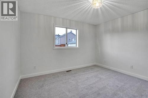 96 Covington Road Ne, Calgary, AB - Indoor Photo Showing Other Room