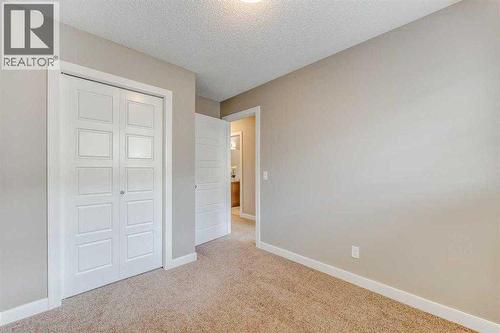 136 Pantego Lane Nw, Calgary, AB - Indoor Photo Showing Other Room
