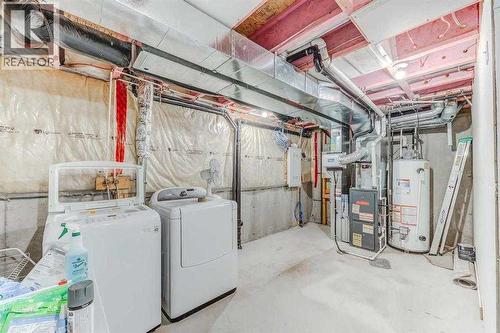 136 Pantego Lane Nw, Calgary, AB - Indoor Photo Showing Laundry Room