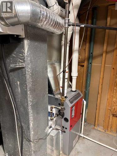 40 Bernard Way Nw, Calgary, AB - Indoor Photo Showing Basement