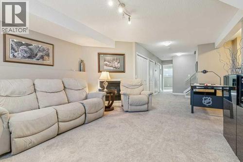 11 Somervale Drive Sw, Calgary, AB - Indoor Photo Showing Living Room With Fireplace