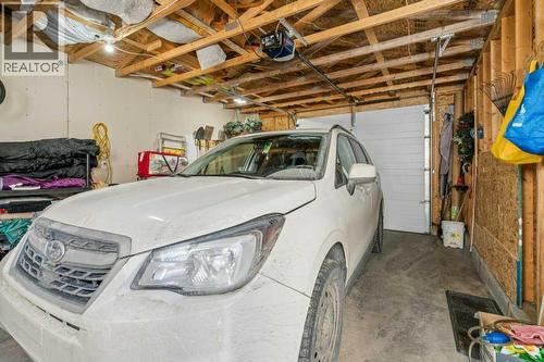 11 Somervale Drive Sw, Calgary, AB - Indoor Photo Showing Garage