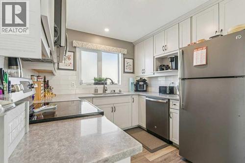 11 Somervale Drive Sw, Calgary, AB - Indoor Photo Showing Kitchen With Stainless Steel Kitchen