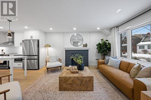 22 Harvard Avenue, Ottawa, ON - Indoor Photo Showing Living Room With Fireplace