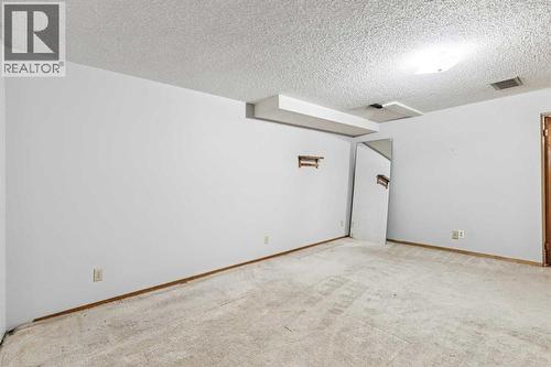 Alternate view of recreation room - 23 Dovercliffe Way Se, Calgary, AB - Indoor Photo Showing Other Room