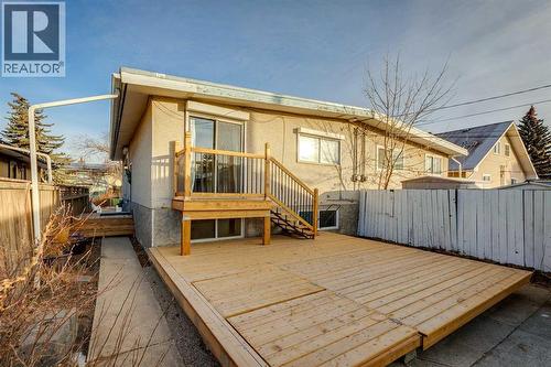 Large deck in backyard - 23 Dovercliffe Way Se, Calgary, AB - Outdoor With Deck Patio Veranda With Exterior