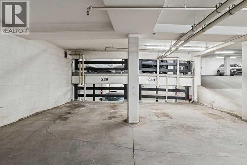 2-Titled side-by-side parking stalls - 904, 530 12 Avenue Sw, Calgary, AB - Indoor Photo Showing Garage
