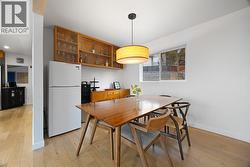 Dining room with additional cabinetry & fridge space - 