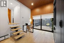 Primary bedroom with it's own laundry & patio access! - 