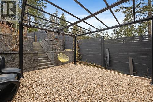 Primary bedroom patio on the back of the property - 1632 Griffiths Place, West Kelowna, BC - 