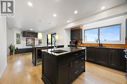 Lots of counter space throughout the kitchen with an additional island sink - 