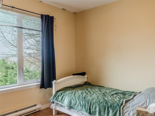 5997/6001 Hammond Bay Rd, Nanaimo, BC - Indoor Photo Showing Bedroom