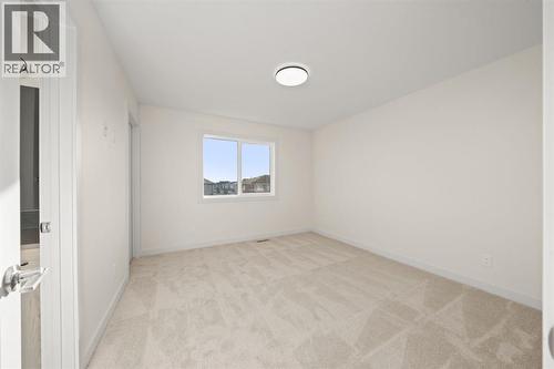 25 Sora Gate Se, Calgary, AB - Indoor Photo Showing Other Room