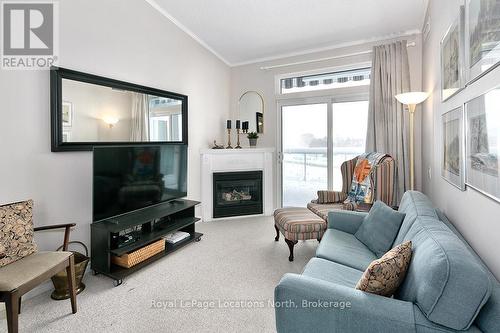 402 - 34 Bayfield Street, Meaford, ON - Indoor Photo Showing Living Room With Fireplace