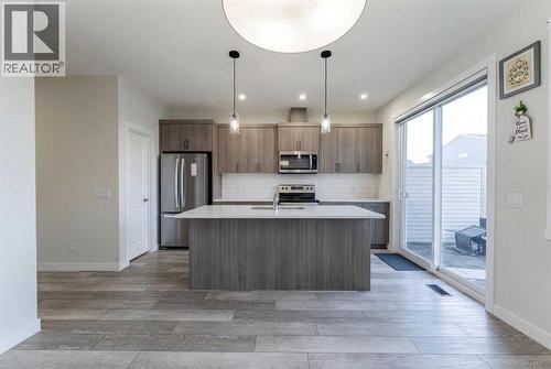 449 Chinook Winds View Sw, Airdrie, AB - Indoor Photo Showing Kitchen With Upgraded Kitchen