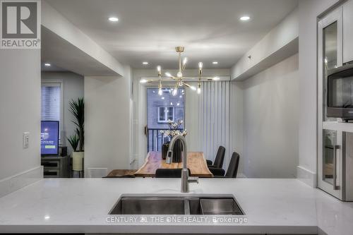 710 - 75 Weldrick Road E, Richmond Hill, ON - Indoor Photo Showing Kitchen With Double Sink
