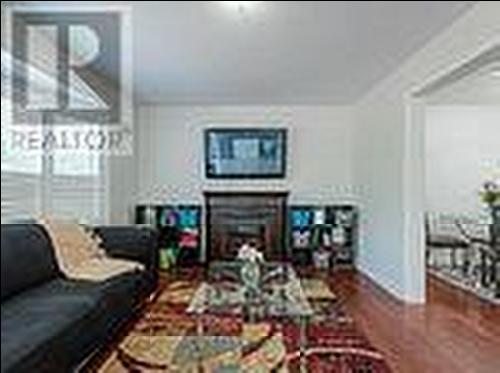 19 Callander Crescent, New Tecumseth, ON - Indoor Photo Showing Living Room With Fireplace