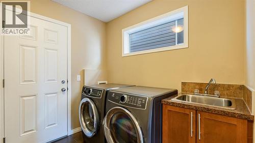 157 Bridleridge View Sw, Calgary, AB - Indoor Photo Showing Laundry Room