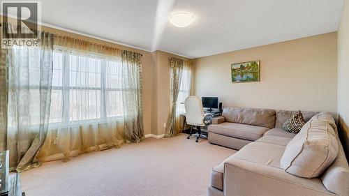 157 Bridleridge View Sw, Calgary, AB - Indoor Photo Showing Living Room