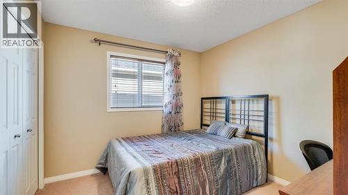 157 Bridleridge View Sw, Calgary, AB - Indoor Photo Showing Bedroom