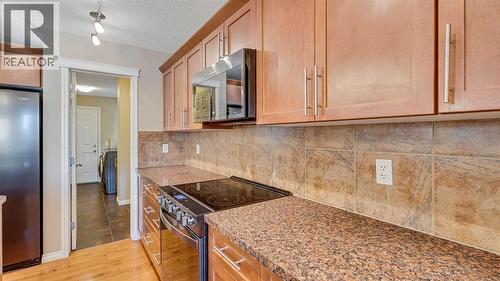 157 Bridleridge View Sw, Calgary, AB - Indoor Photo Showing Kitchen