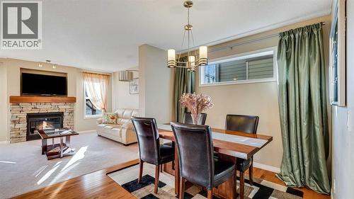 157 Bridleridge View Sw, Calgary, AB - Indoor Photo Showing Other Room With Fireplace