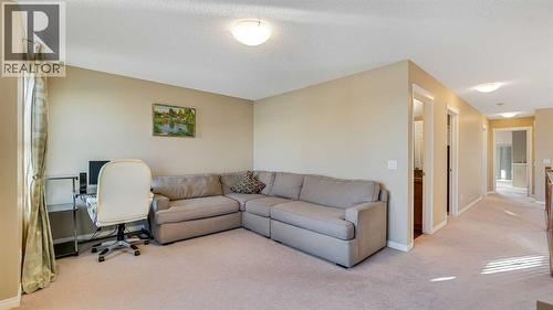 157 Bridleridge View Sw, Calgary, AB - Indoor Photo Showing Living Room